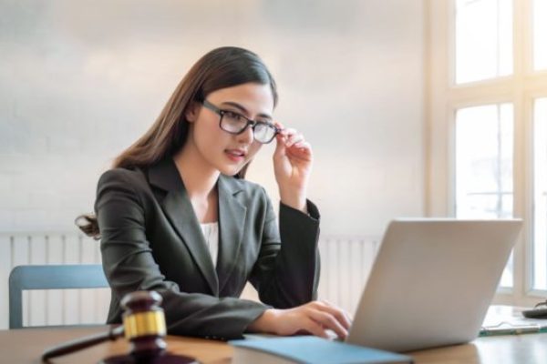 beautiful young asian lawyer woman sitting working in the office.